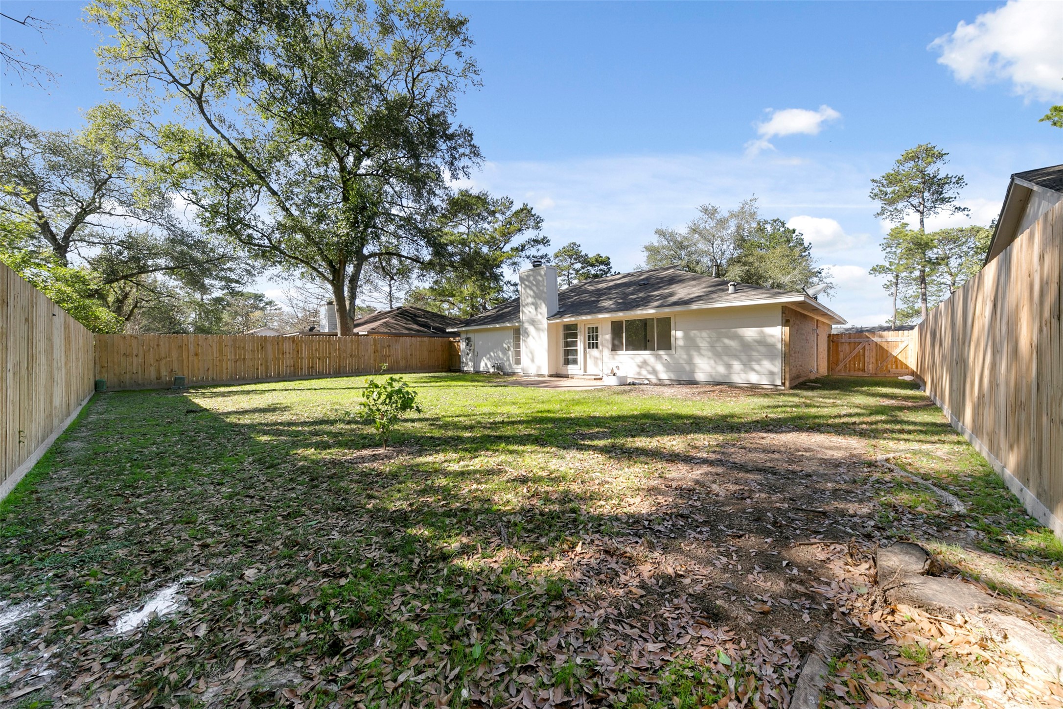 2042 Lexington Woods Drive Spring, TX 77373 - Photo 31 of 32 a view of a house with a yard