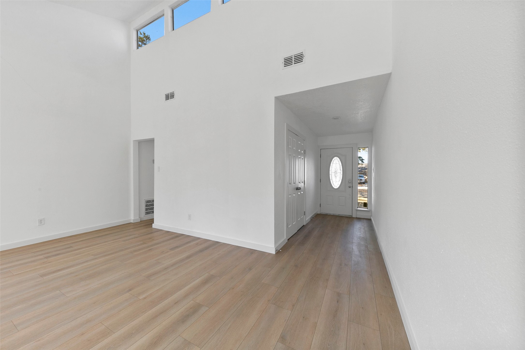 2042 Lexington Woods Drive Spring, TX 77373 - Photo 8 of 32 a view of entryway with wooden floor