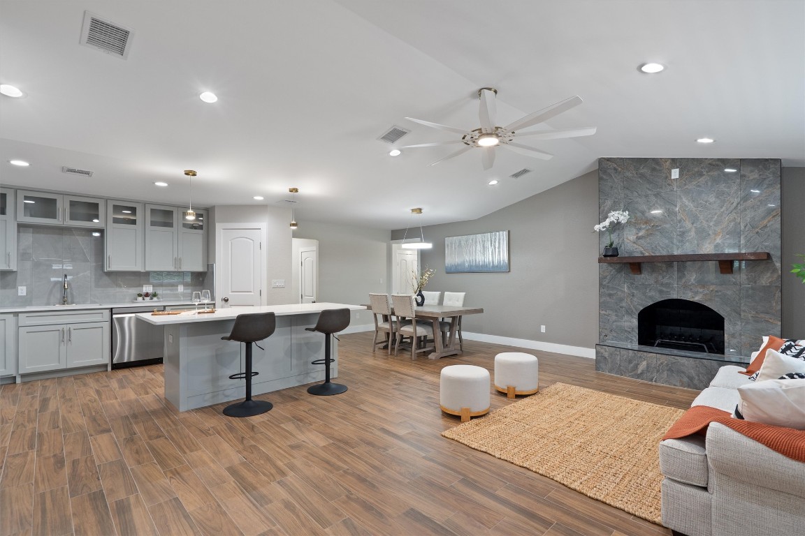 803 Glen Road Austin, TX 78753 - Photo 3 of 35 a living room with furniture and a fireplace