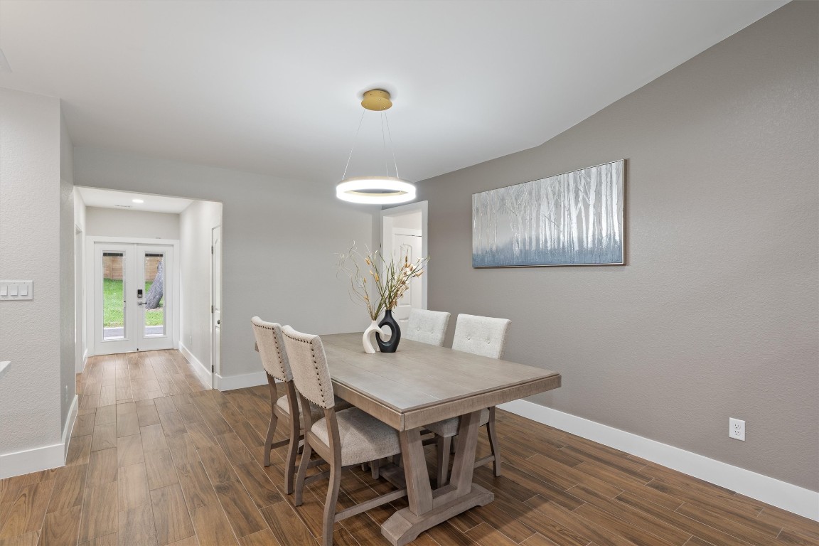 803 Glen Road Austin, TX 78753 - Photo 8 of 35 a view of a livingroom with furniture and wooden floor