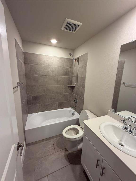 702 Williams Way Lowry Crossing, TX 75069 - Photo 16 of 22 a bathroom with a sink a toilet and a bathtub