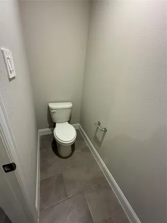 a bathroom with a toilet
