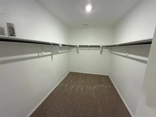 a view of small space with racks on the wall