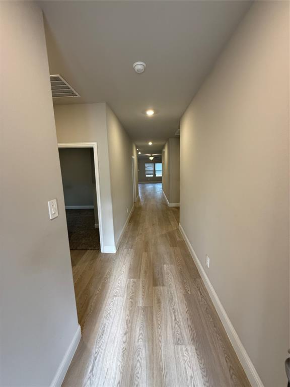 702 Williams Way Lowry Crossing, TX 75069 - Photo 7 of 22 a view of gallery with wooden floor