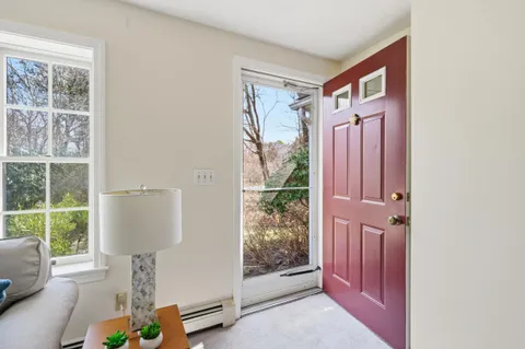 a kitchen that has a sink and a stove in it