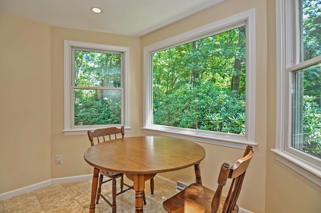 948 Salem End Road Framingham, MA 01702 - Photo 12 of 23 a view of a dining room with furniture and window