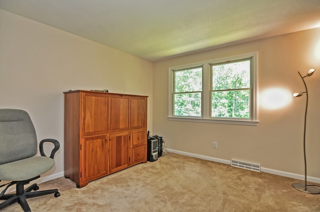 948 Salem End Road Framingham, MA 01702 - Photo 17 of 23 a view of workspace with furniture and a window