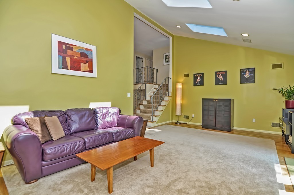 948 Salem End Road Framingham, MA 01702 - Photo 5 of 23 a living room with furniture and a potted plant