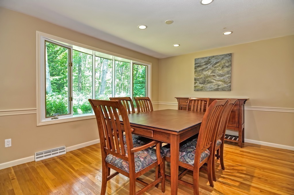 948 Salem End Road Framingham, MA 01702 - Photo 7 of 23 a view of a dining room with furniture window and wooden floor