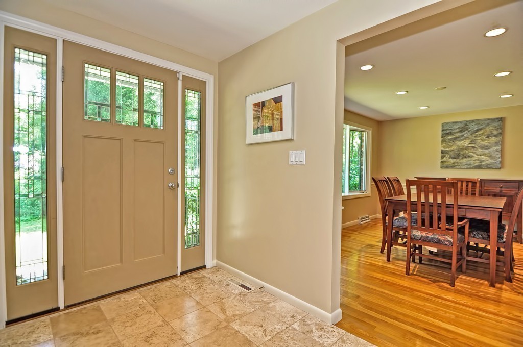 948 Salem End Road Framingham, MA 01702 - Photo 8 of 23 a view of a dining room with furniture window and wooden floor