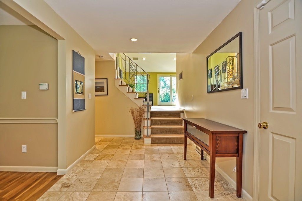 948 Salem End Road Framingham, MA 01702 - Photo 9 of 23 a view of a hallway with seating area