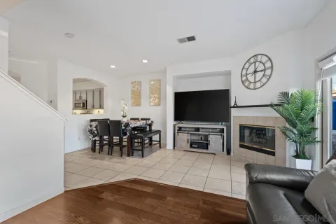a view of a livingroom with furniture and a flat screen tv