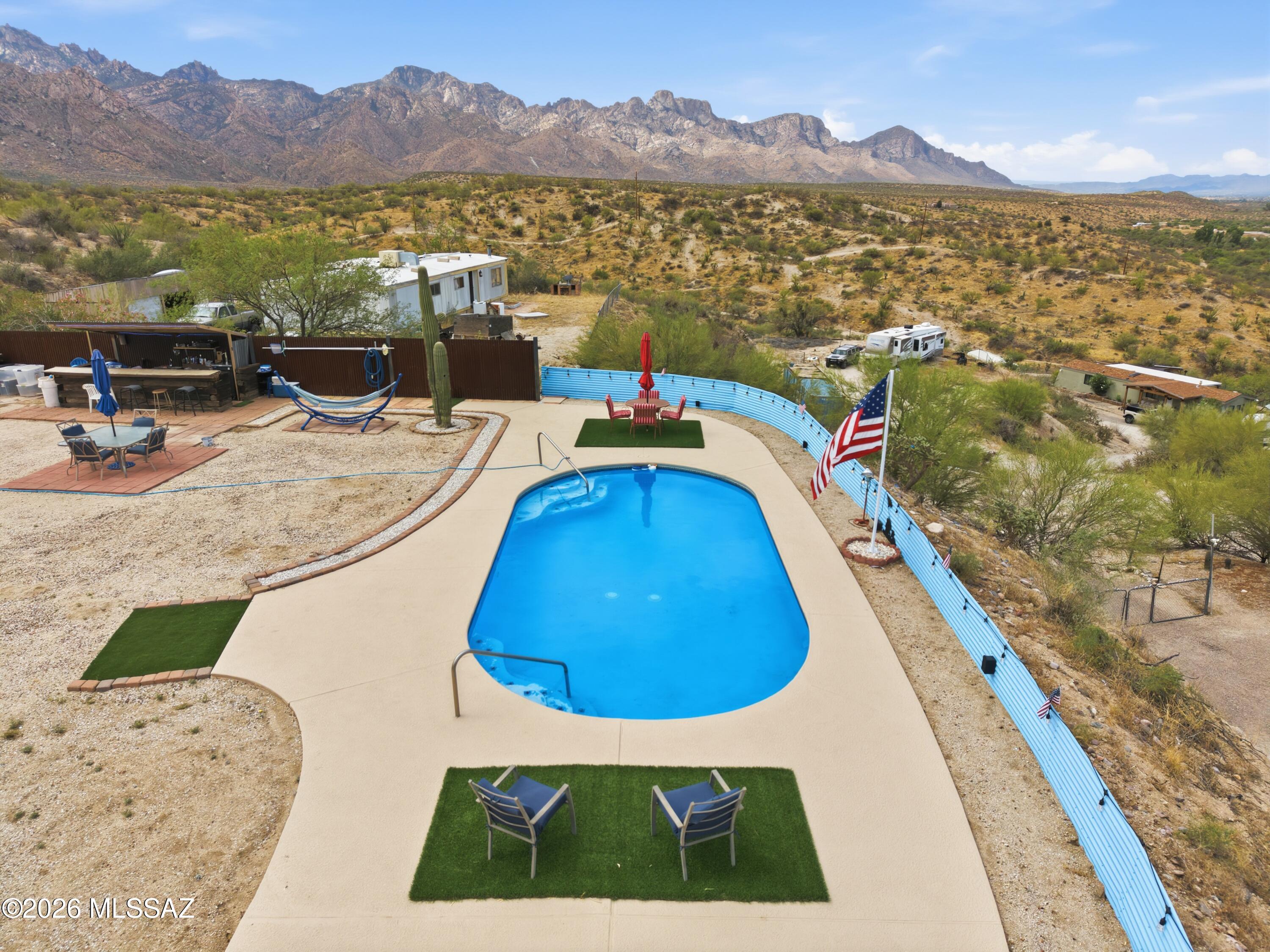 4461 East Rollins Road Tucson, AZ 85739 - Photo 7 of 14 Pool decking around pool