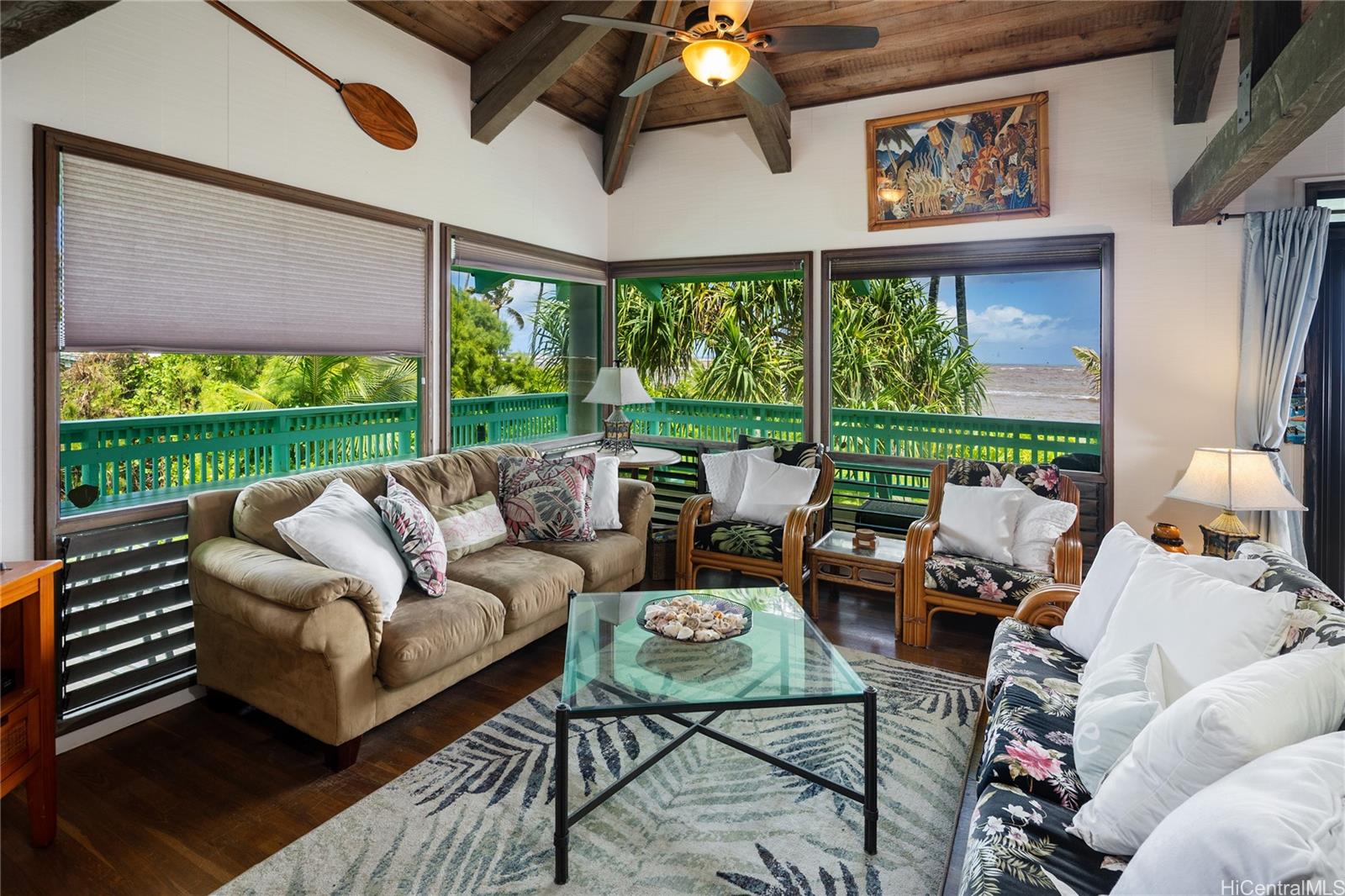 67-421 Waialua Beach Road Waialua, HI 96791 - Photo 13 of 25 a living room with furniture and a large window