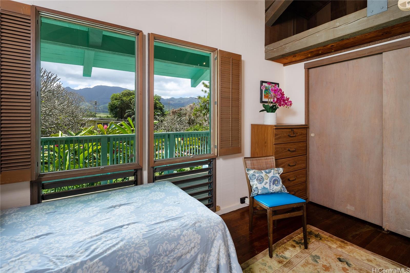 67-421 Waialua Beach Road Waialua, HI 96791 - Photo 16 of 25 a bed room with a bed and a window
