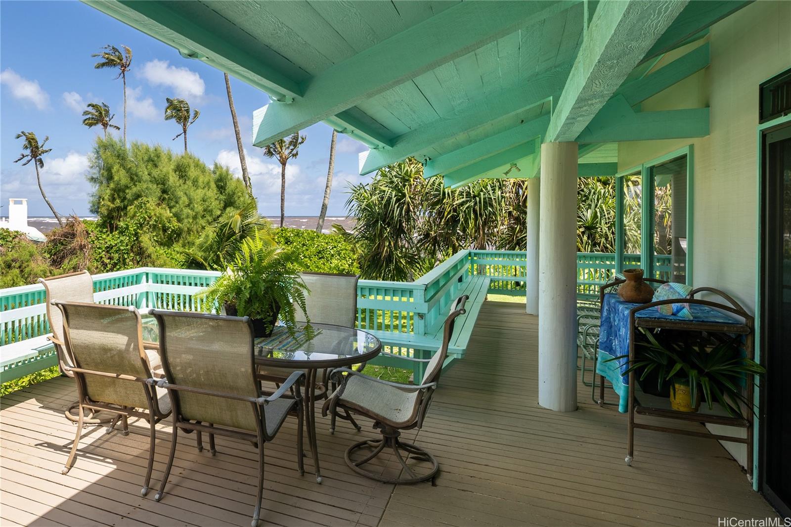 67-421 Waialua Beach Road Waialua, HI 96791 - Photo 6 of 25 a view of an chairs and table in the patio
