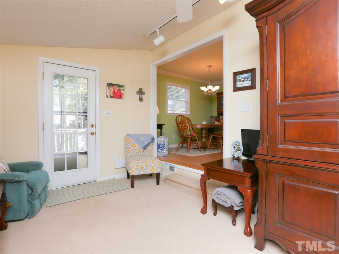 403 Kevin Circle Raleigh, NC 27609 - Photo 13 of 25 a living room with furniture and a window