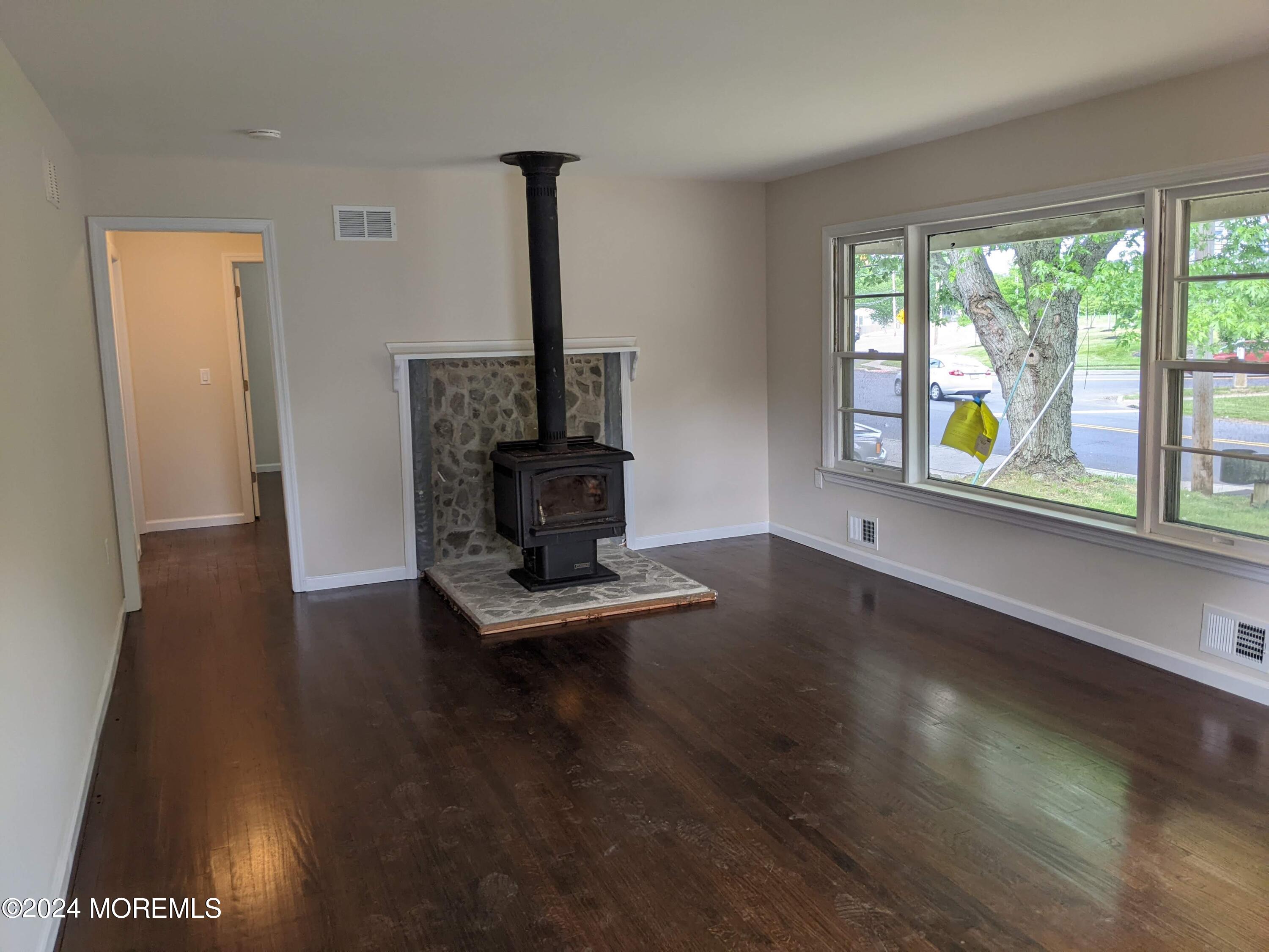 509 Stone Road Union Beach, NJ 07735 - Photo 6 of 16 a living room with furniture window and wooden floor