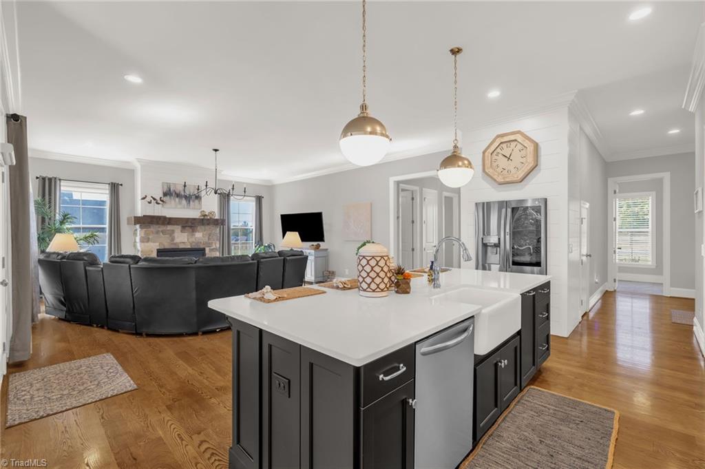 4262 Bridgehead Road Kernersville, NC 27284 - Photo 14 of 50 Kitchen to Living View – Open layout connects seamlessly to the living room, creating the perfect flow for entertaining and everyday life.