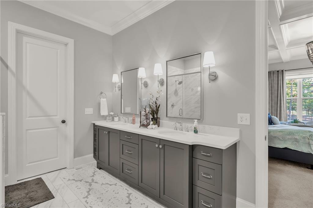 4262 Bridgehead Road Kernersville, NC 27284 - Photo 20 of 50 Ensuite Bath View – Elegant and functional layout with designer lighting, quartz counters, and abundant storage for everyday luxury.