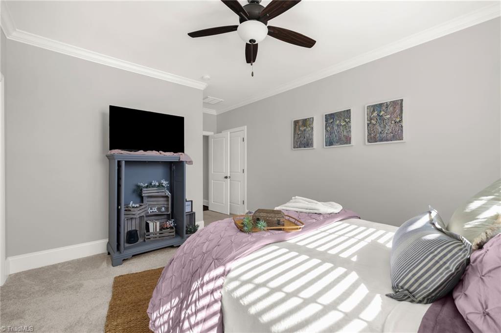 4262 Bridgehead Road Kernersville, NC 27284 - Photo 26 of 50 Bedroom Alternate View – Beautiful natural light and ample closet space make this room ideal for guests or family members.