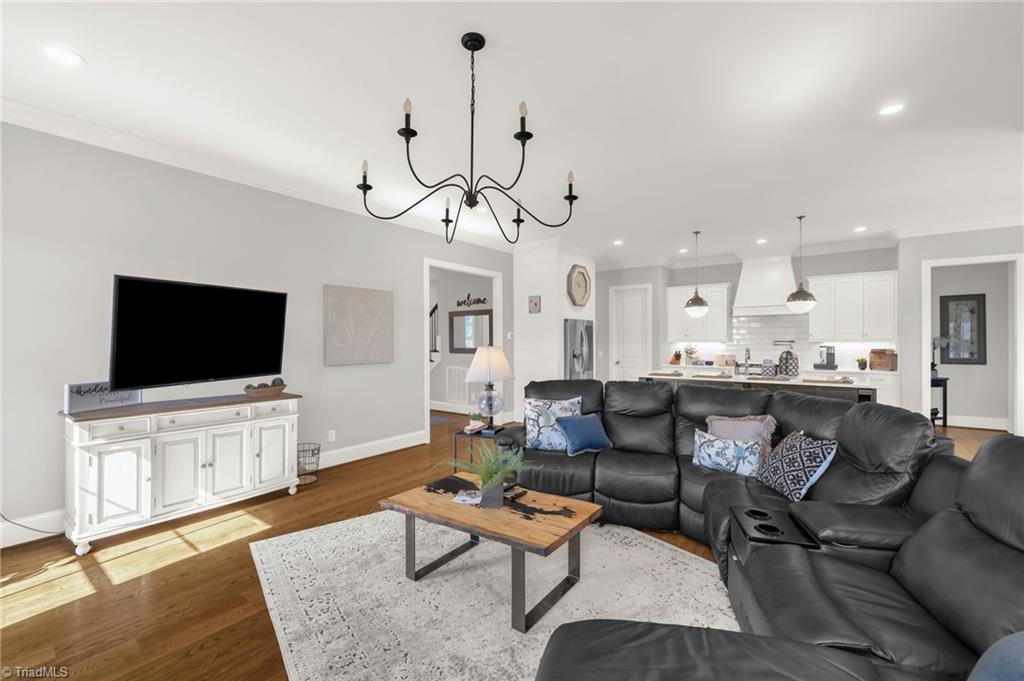 4262 Bridgehead Road Kernersville, NC 27284 - Photo 9 of 50 Living to Kitchen View – Open-concept design connects living and kitchen areas for easy entertaining and family flow.