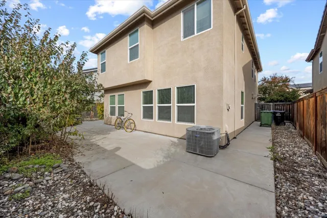 a front view of a house with patio