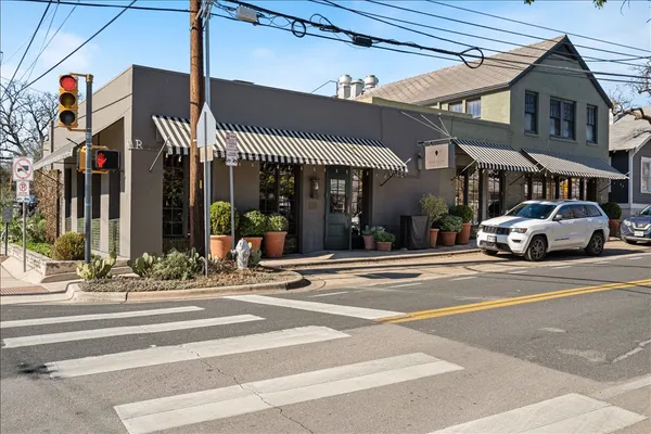 a front view of a building with street view
