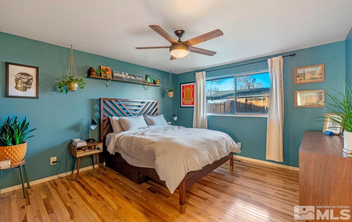 1775 Carlin Street Reno, NV 89503 - Photo 11 of 20 a bedroom with a bed and window