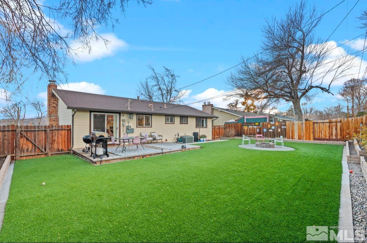 1775 Carlin Street Reno, NV 89503 - Photo 18 of 20 a view of a house with a yard porch and sitting area