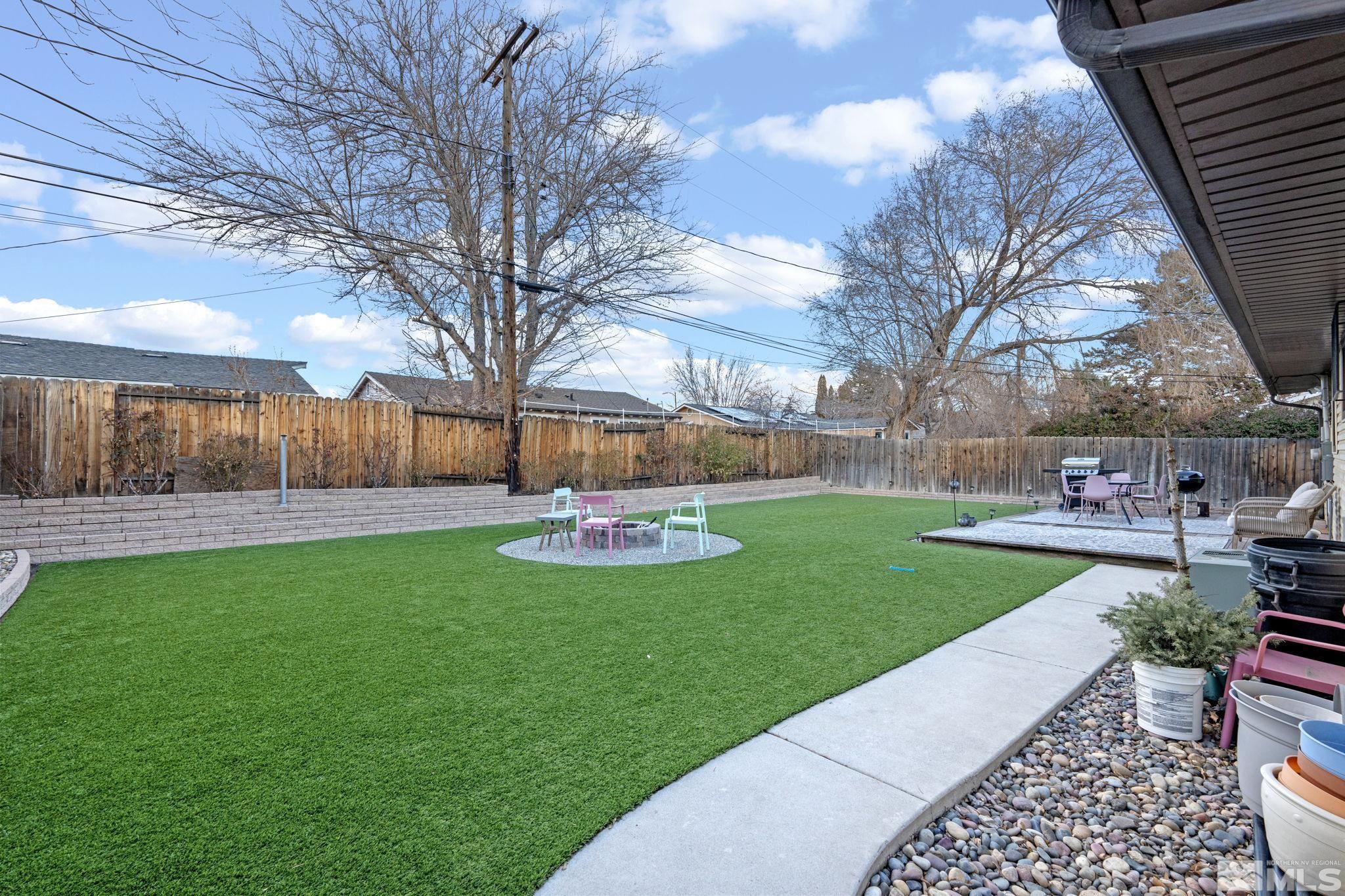 1775 Carlin Street Reno, NV 89503 - Photo 19 of 20 a view of backyard with seating and green space