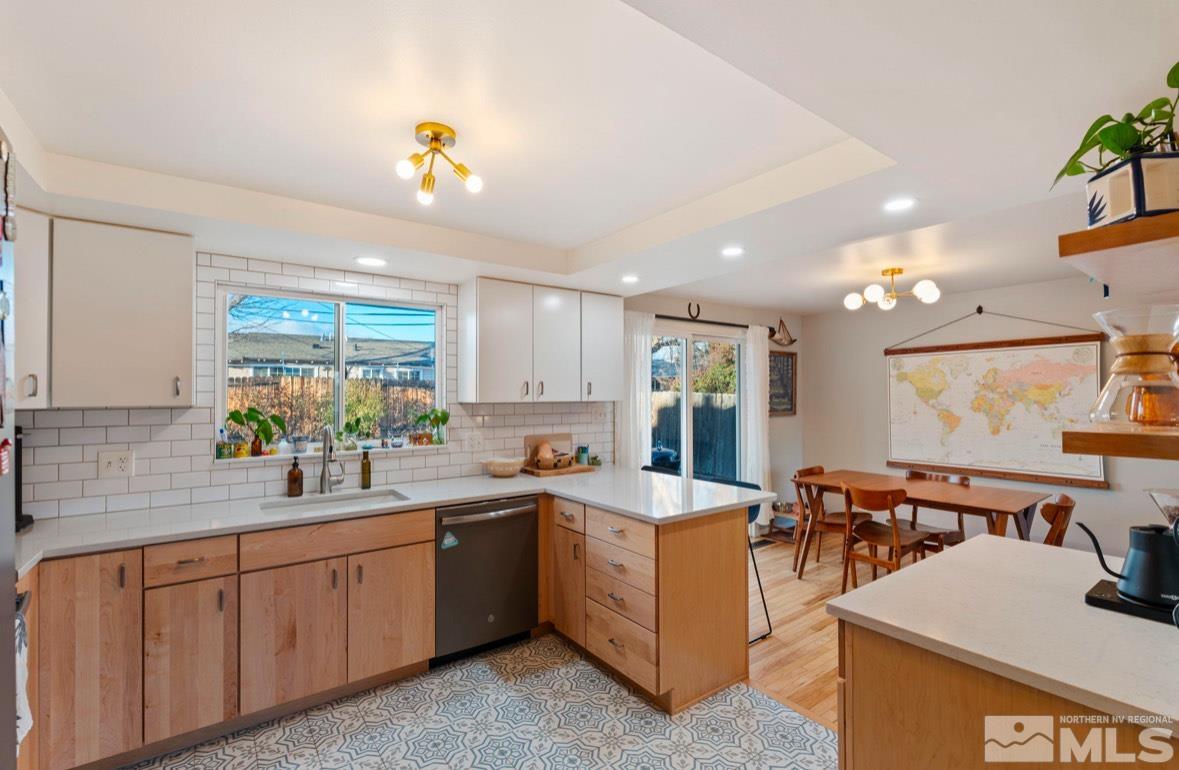 1775 Carlin Street Reno, NV 89503 - Photo 7 of 20 a kitchen with a sink and cabinets