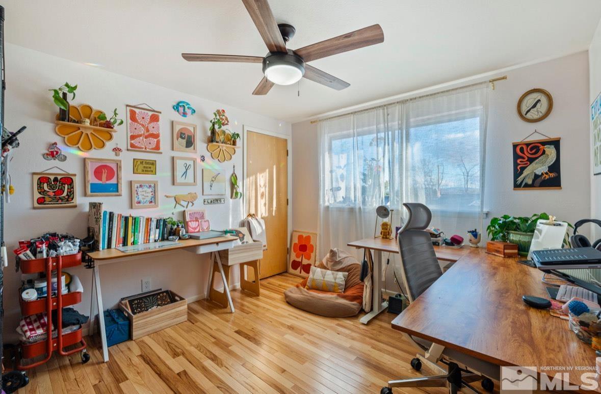 1775 Carlin Street Reno, NV 89503 - Photo 8 of 20 a view of a workspace with furniture and a window