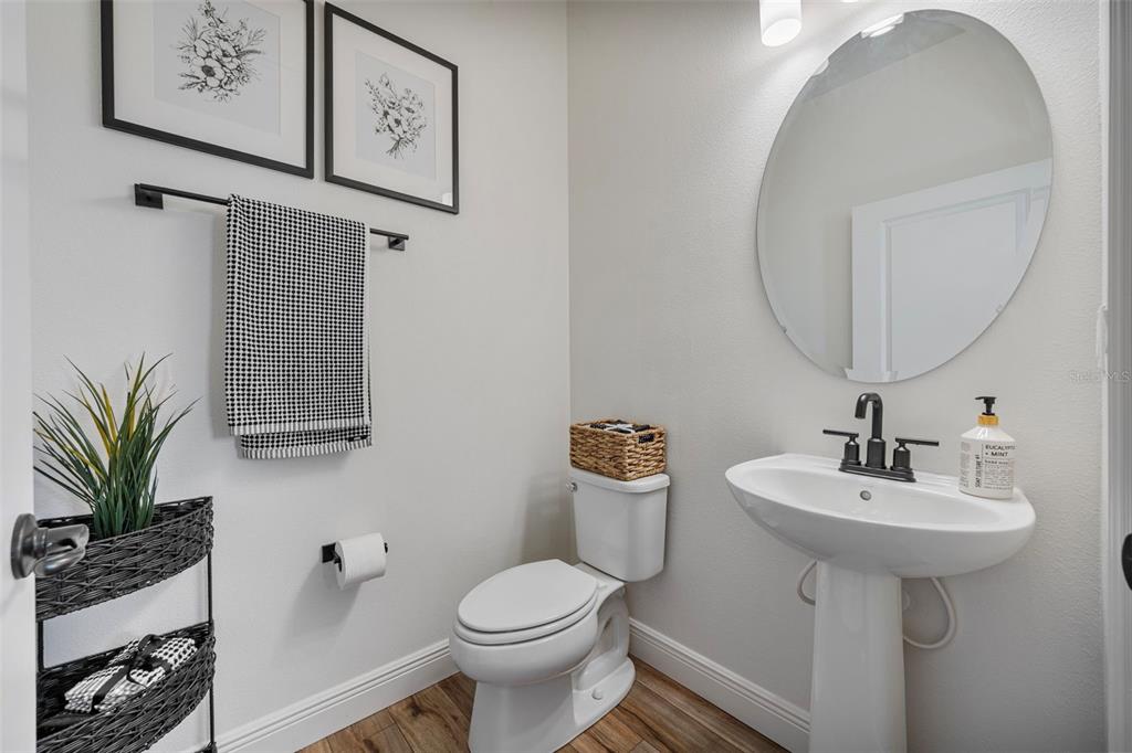 11430 Gallatin Trail Parrish, FL 34219 - Photo 17 of 79 a bathroom with a sink toilet and a mirror