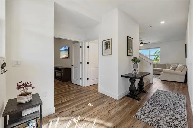 a living room with furniture and a rug