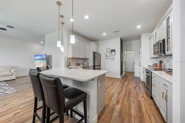 a bedroom with a bed and a television