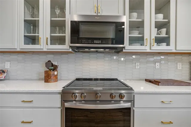 a bathroom with a shower and a sink