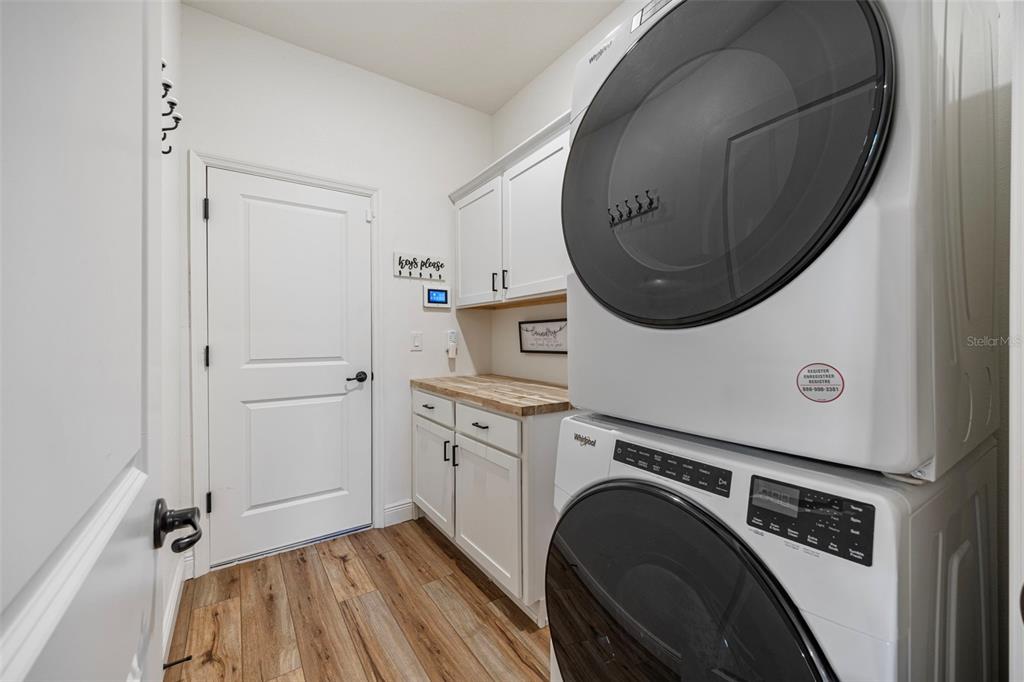 11430 Gallatin Trail Parrish, FL 34219 - Photo 28 of 79 a view of a storage and utility room with a washer dryer