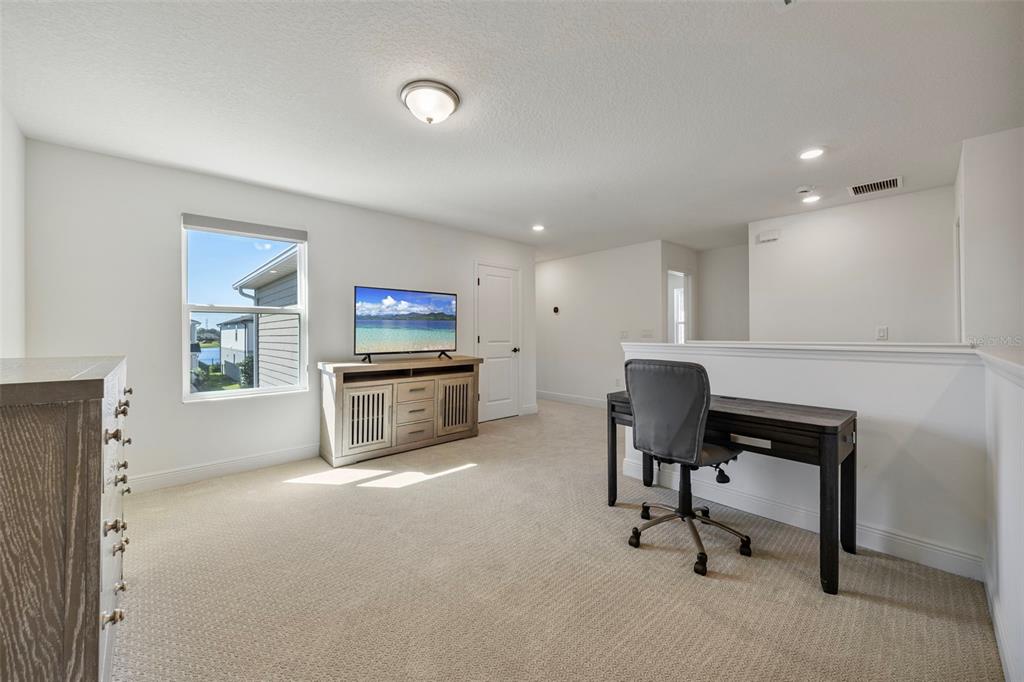 11430 Gallatin Trail Parrish, FL 34219 - Photo 30 of 79 a workspace with furniture and a window