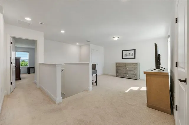 a view of a backyard with plants and a garden