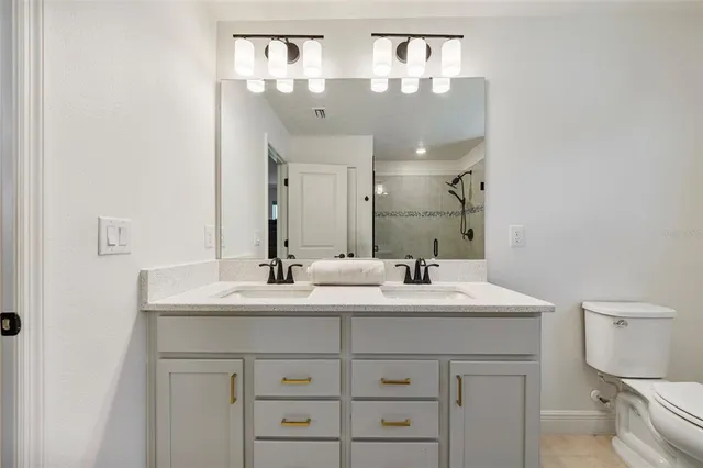 a aerial view of a house with a yard