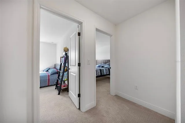 a building outdoor space with patio furniture and potted plants