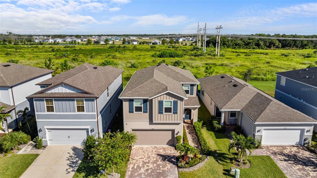 11430 Gallatin Trail Parrish, FL 34219 - Photo 52 of 79 a aerial view of a house with a big yard