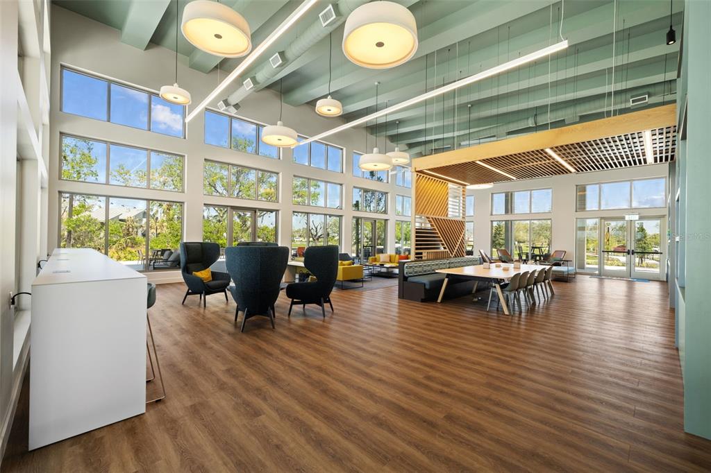 11430 Gallatin Trail Parrish, FL 34219 - Photo 71 of 79 a living room with furniture and wooden floor
