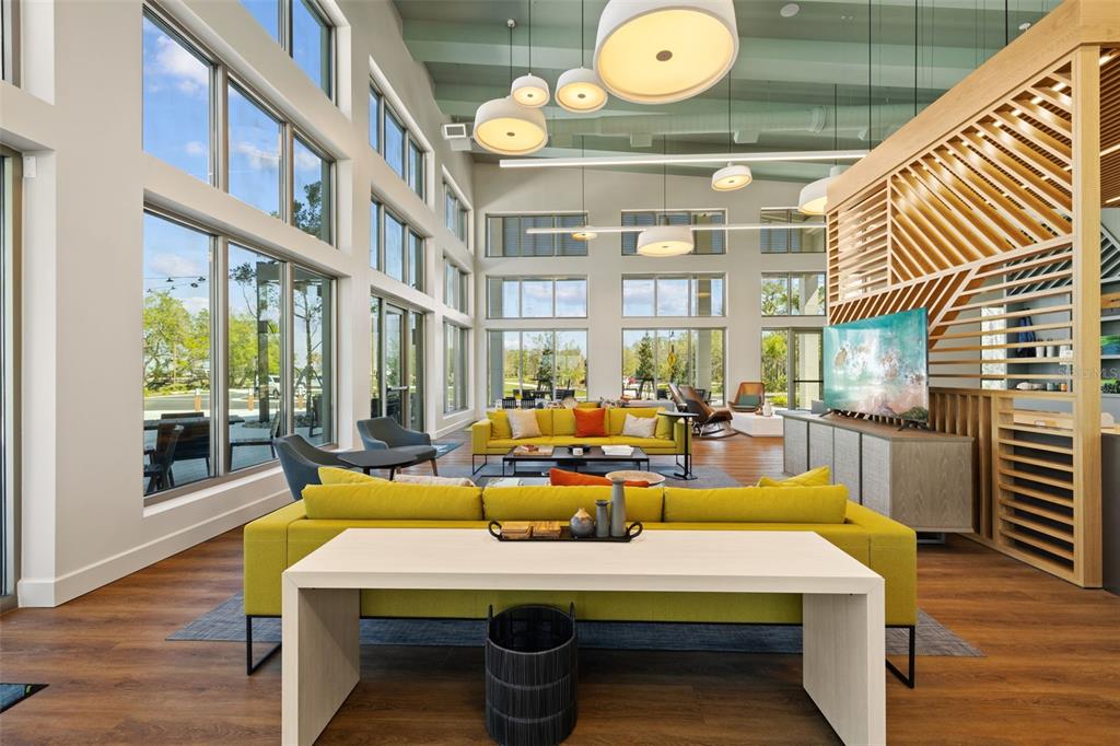 11430 Gallatin Trail Parrish, FL 34219 - Photo 72 of 79 a view of a dining room with furniture window and wooden floor