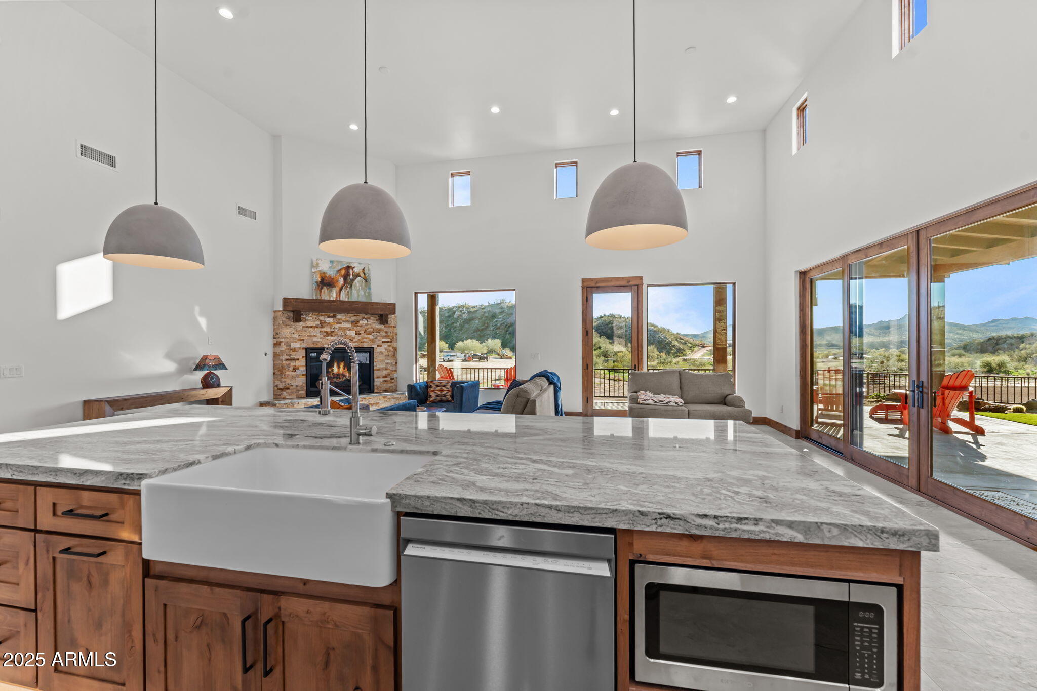 30100 Walter Road Wickenburg, AZ 85390 - Photo 16 of 66 a kitchen with a stove and a wooden floor