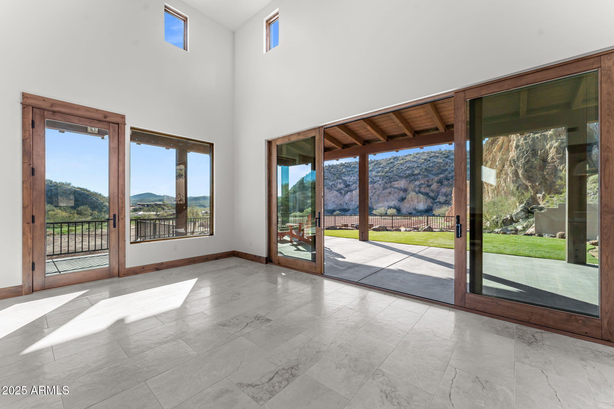 30100 Walter Road Wickenburg, AZ 85390 - Photo 26 of 66 a view of an empty room with a large window