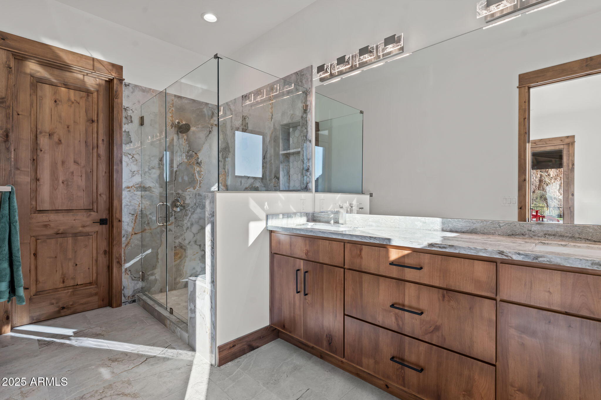 30100 Walter Road Wickenburg, AZ 85390 - Photo 35 of 66 a bathroom with a granite countertop sink mirror and double