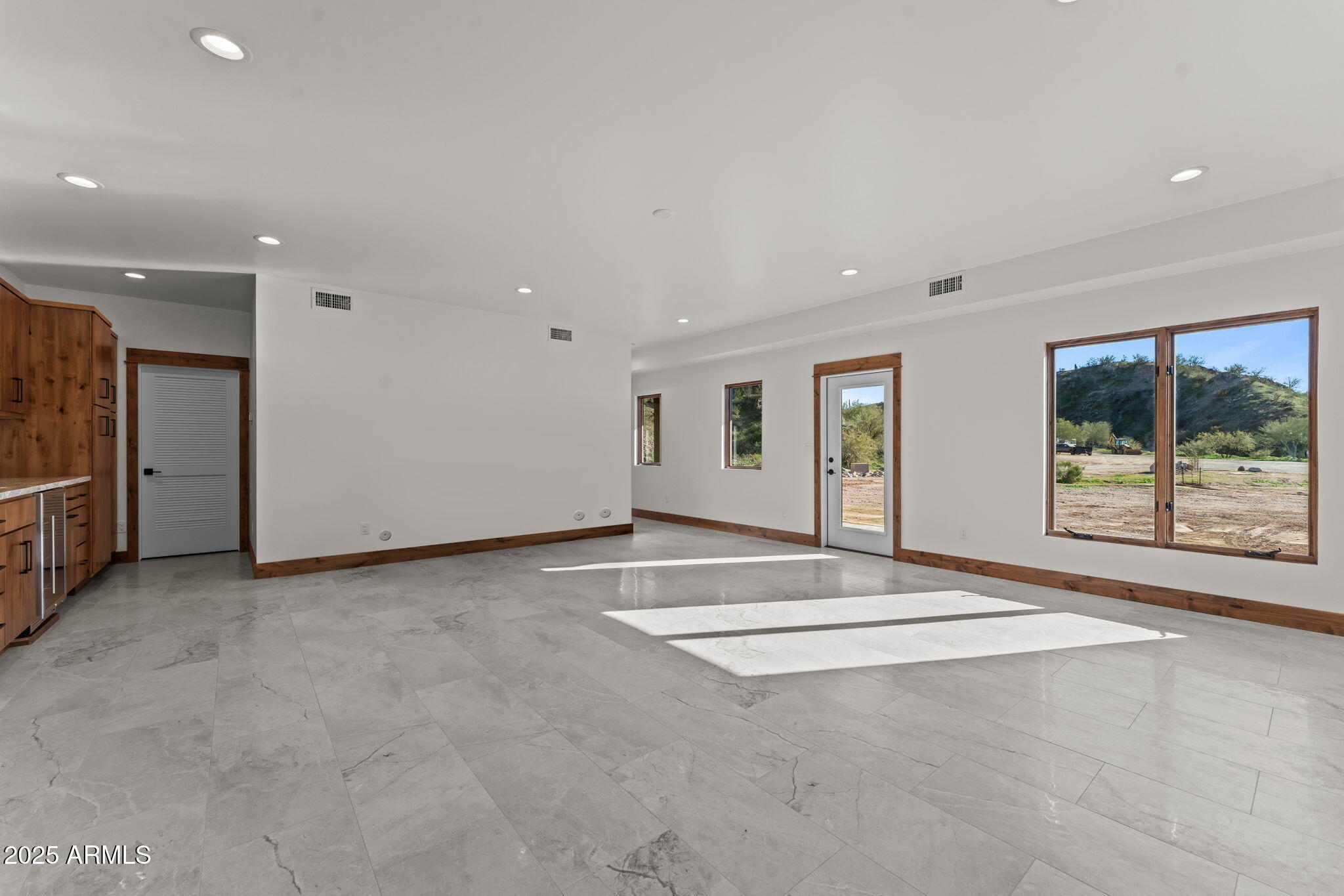 30100 Walter Road Wickenburg, AZ 85390 - Photo 43 of 66 a view of an empty room with a window