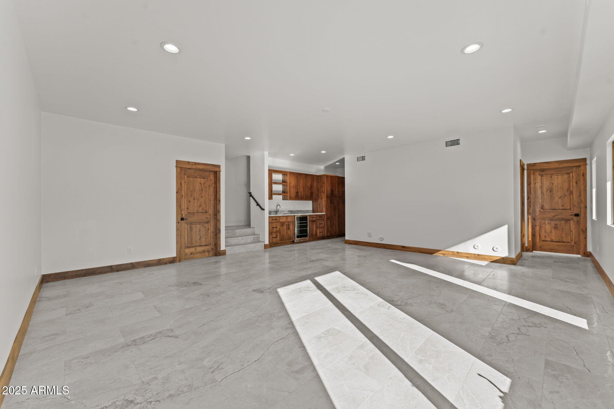 30100 Walter Road Wickenburg, AZ 85390 - Photo 44 of 66 a view of an empty room with a kitchen